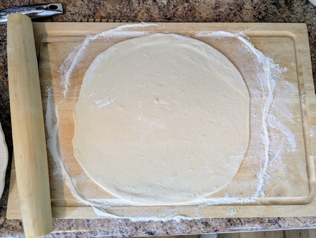 Rolling out sourdough tortillas