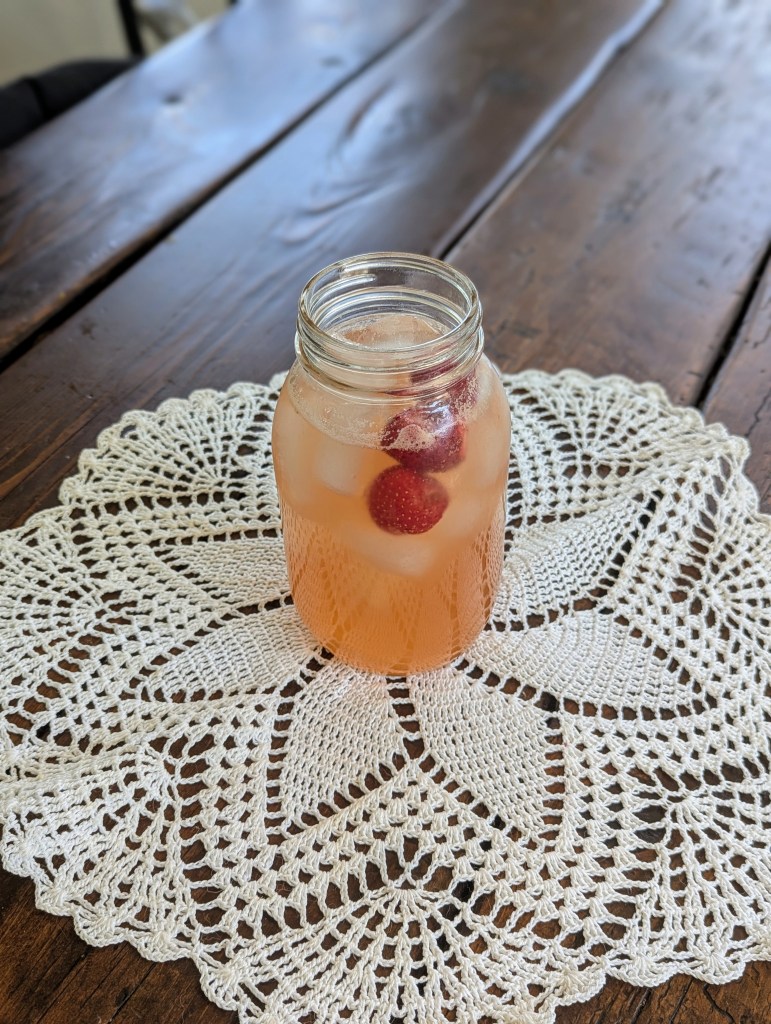 strawberry chamomile electrolyte mocktail on farmhouse table