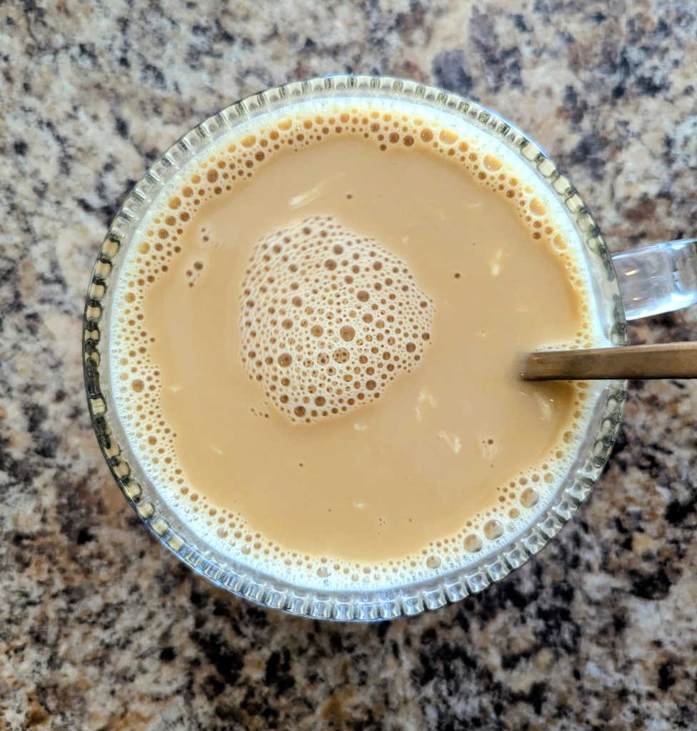 Adding coffee to egg yolk coffee