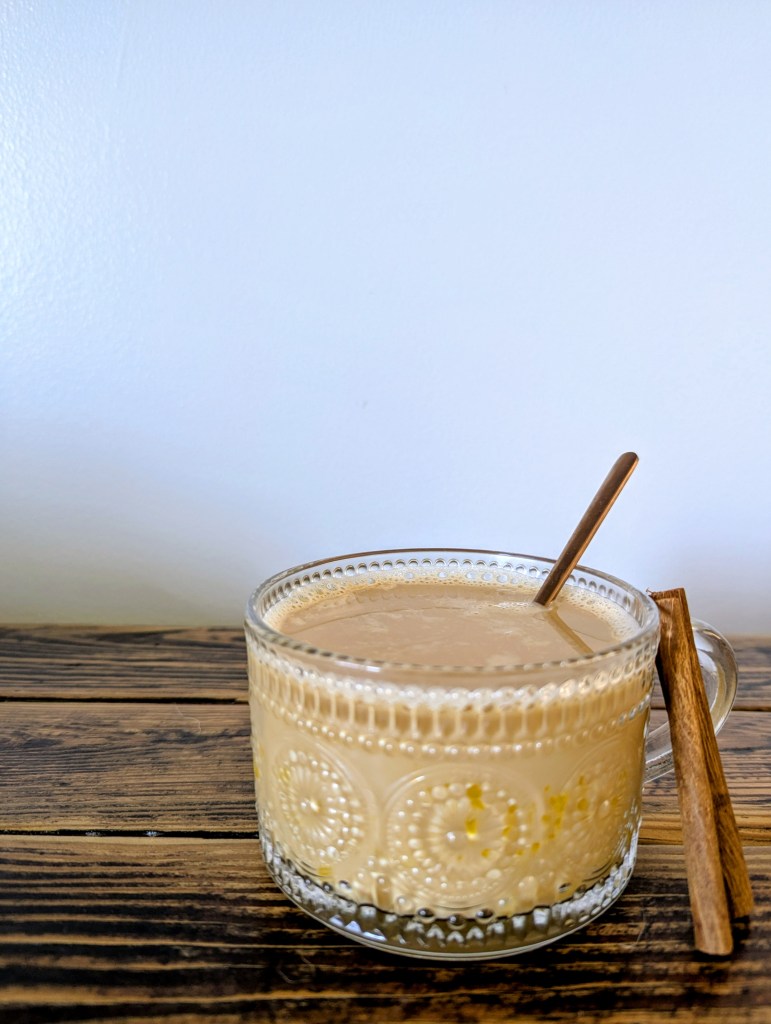 Liver detox drink with egg yolk and dandelion tea on farmhouse table