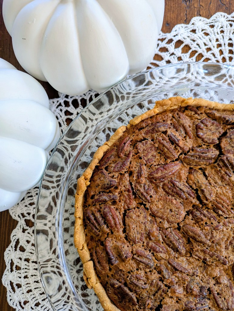 healthy pecan pie without corn syrup on a lace doily