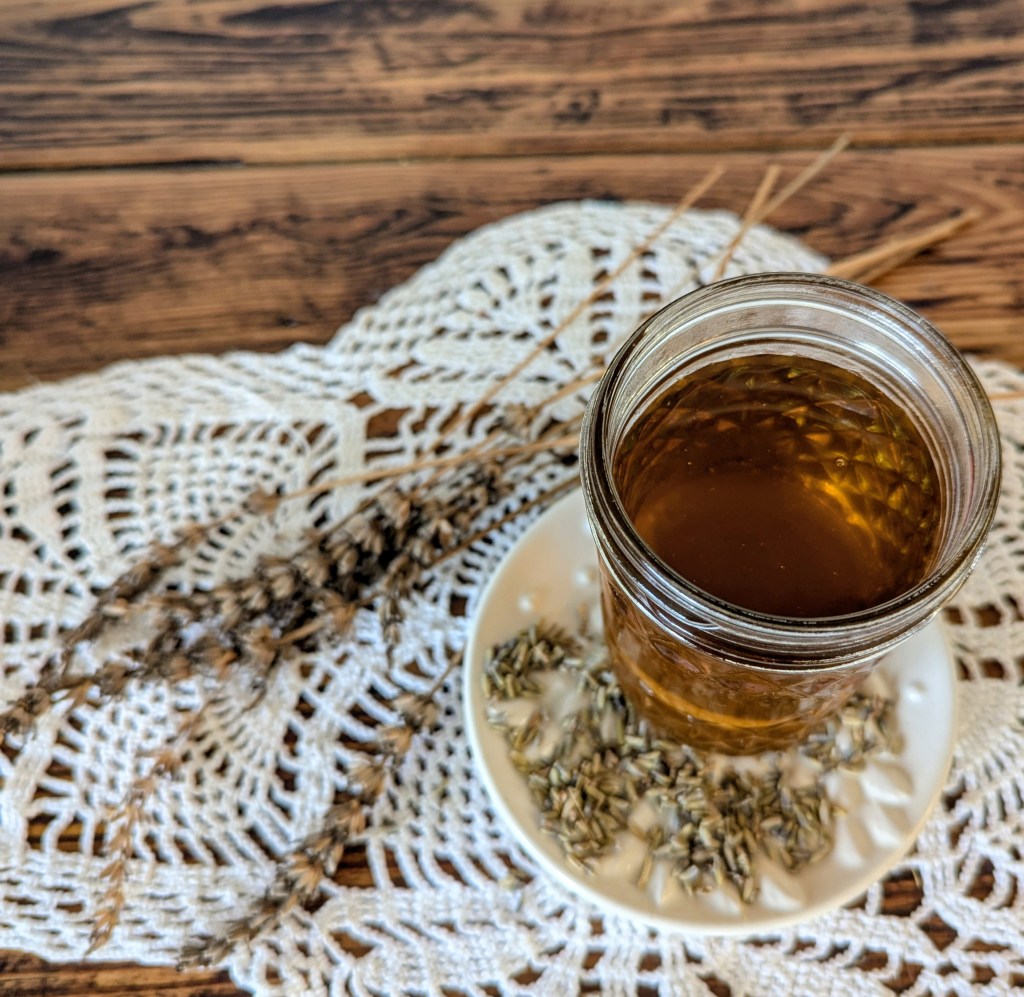 Homemade lavender simple syrup on a farmhouse table