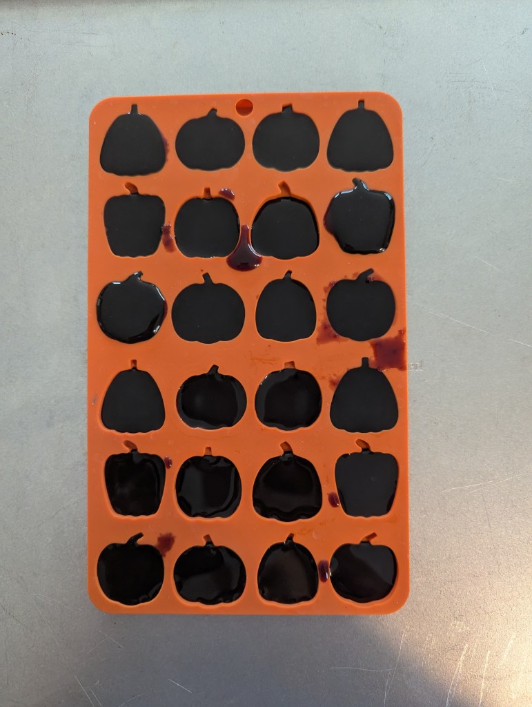 Elderberry gummies for kids in a silicone mold