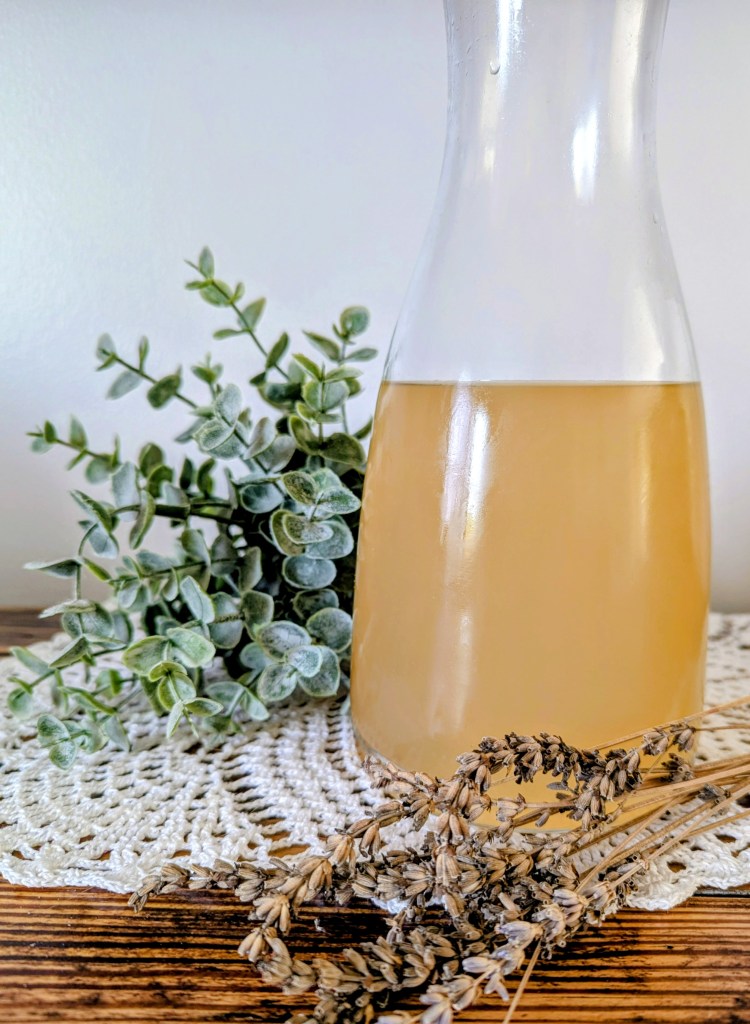 Lavender lemonade on a wooden farmhouse table