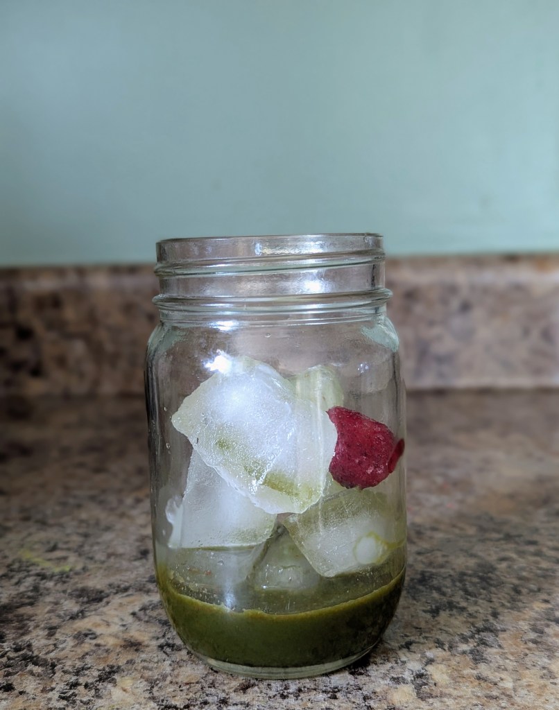 Making a strawberry matcha latte with powdered strawberries