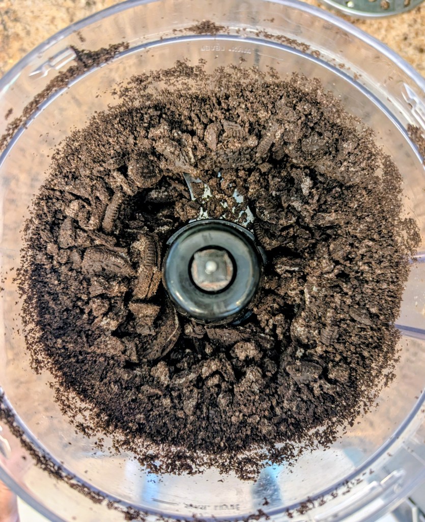 Oreo cookie in a food processor for oreo pie crust recipe