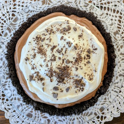 Aerial shot of chocolate silk pie on a farmhouse table