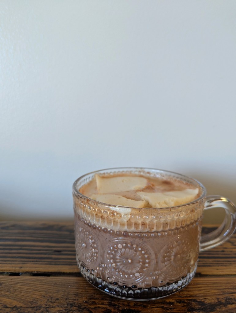 Bone broth hot chocolate on a farmhouse table