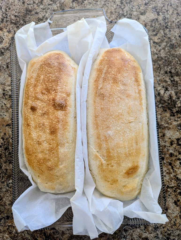 Aerial shot of golden sourdough French bread right out of the oven