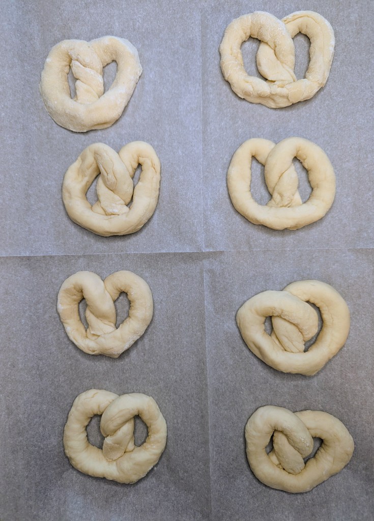 Sourdough pretzels on a baking sheet before baking