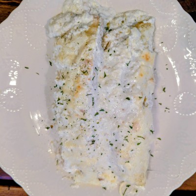 Plated chicken enchiladas verde