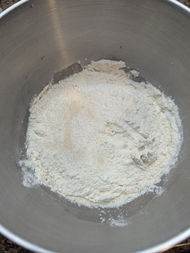 Mixing ingredients for sourdough pretzel bites