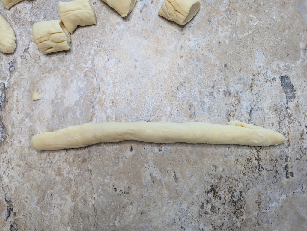 rollng out sourdough pretzel bite dough