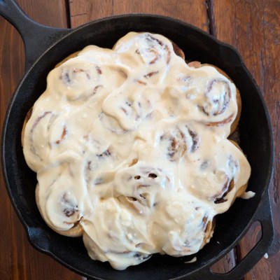 Aerial shot of sourdough discard cinnamon rolls with glze