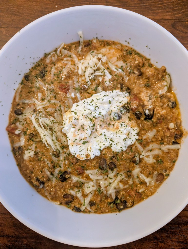 Quinoa enchilada casserole with sour cream