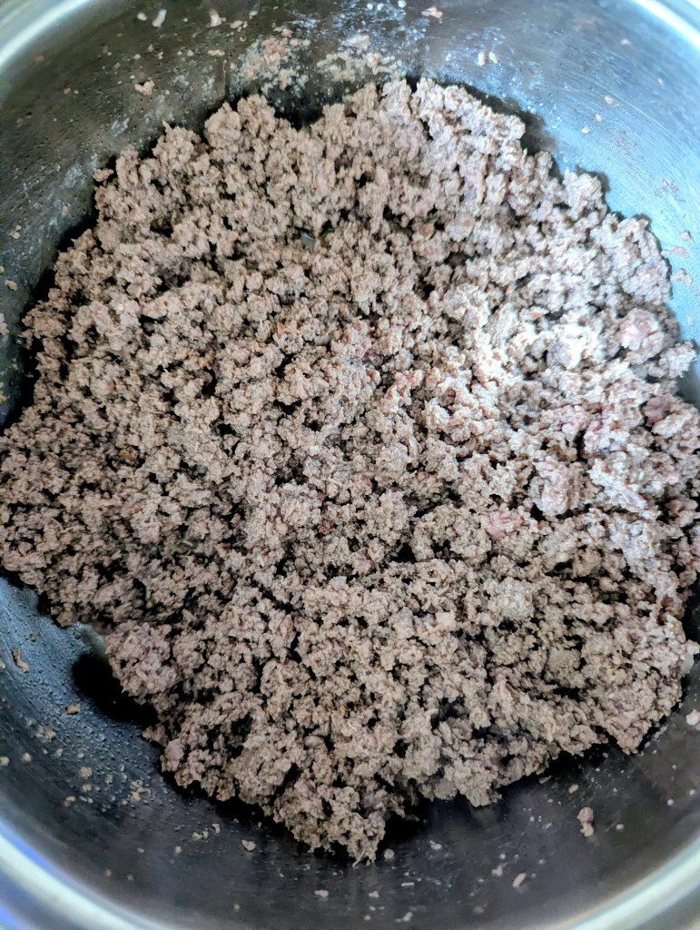 Browning ground beef for million dollar spaghetti recipe