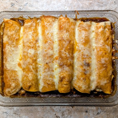 Aerial shot of chicken enchiladas with cream cheese