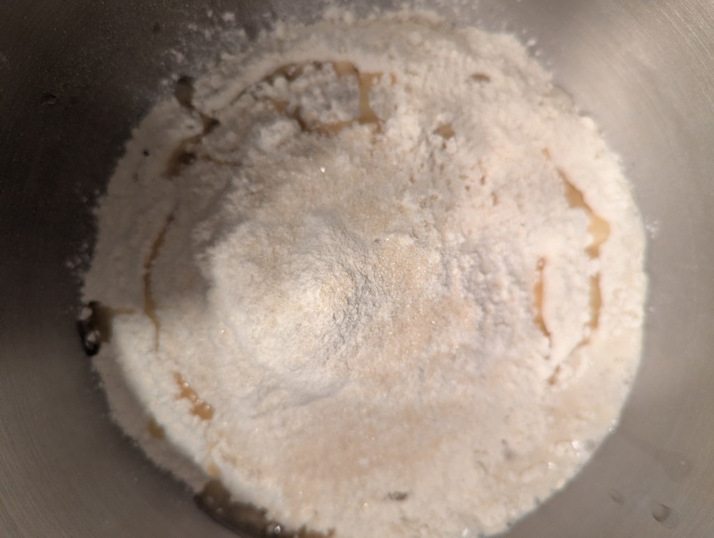 Mixing flour and sourdough discard for bagels