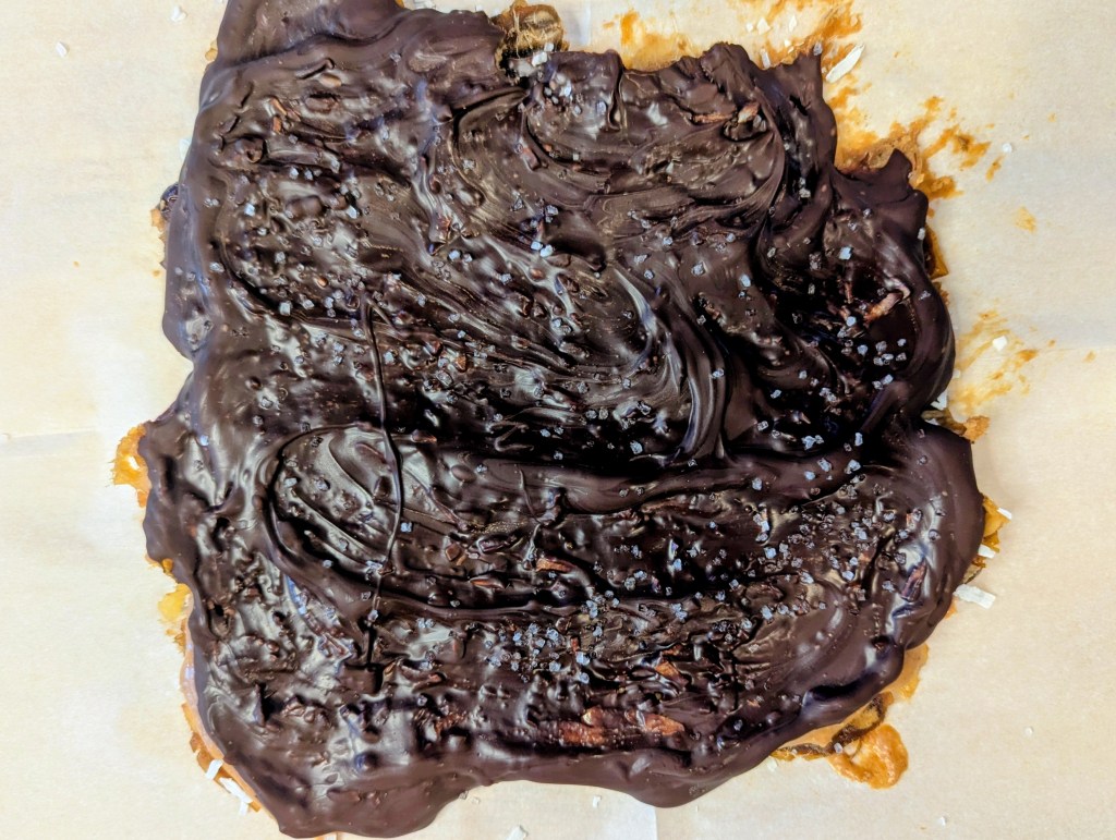 date bark with melted chocolate before freezing