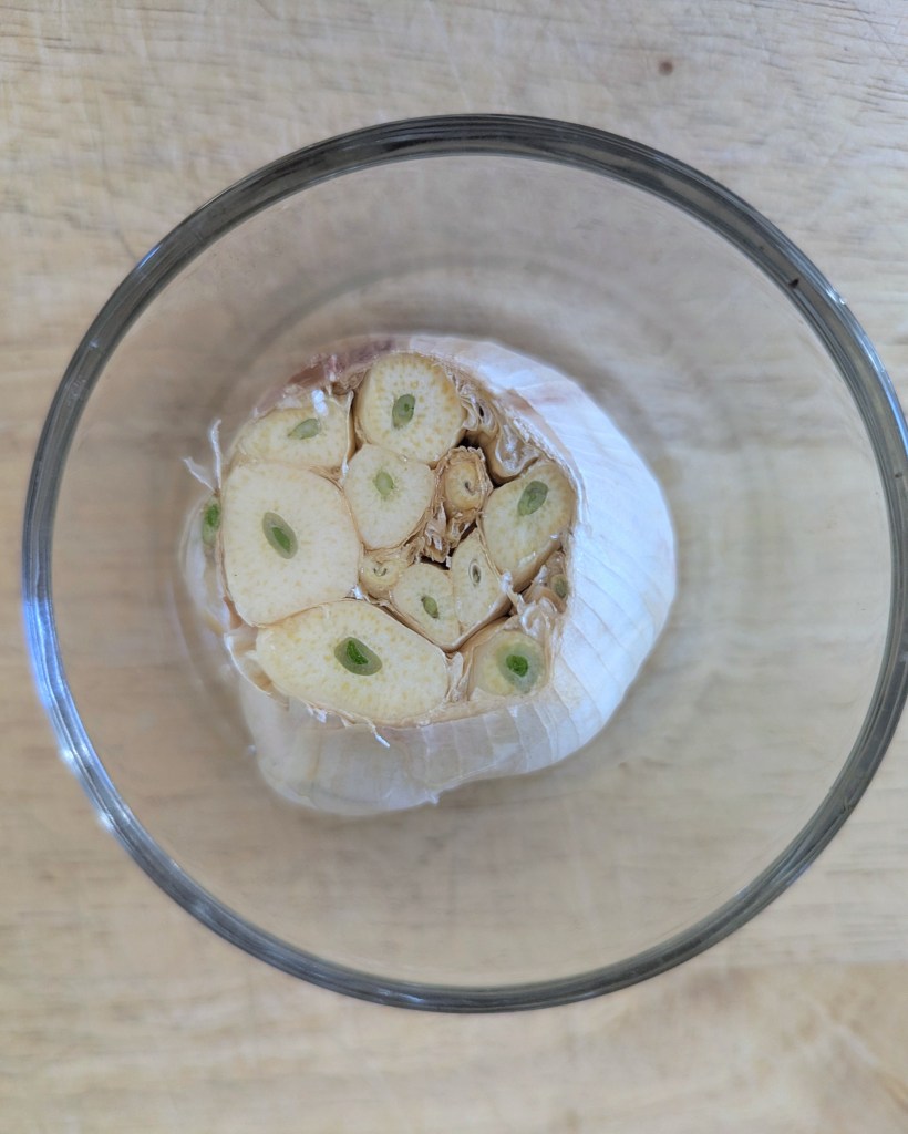 Head of garlic fbefore roasting for tomato soup from canned tomatoes
