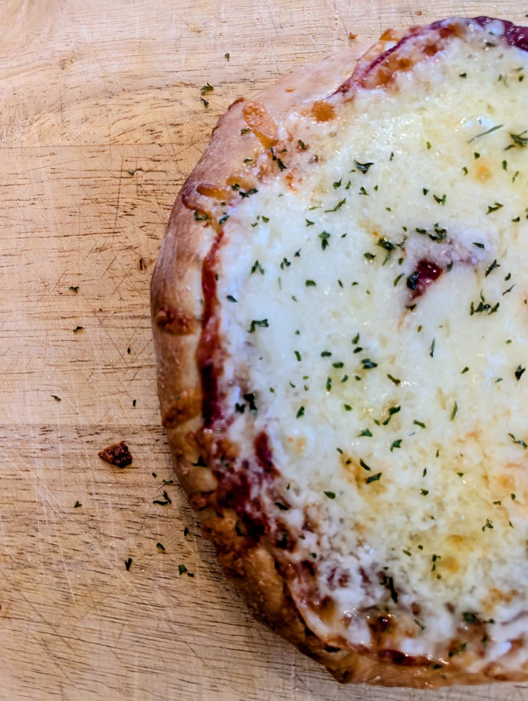 Sourdough pizza dough with melted cheese