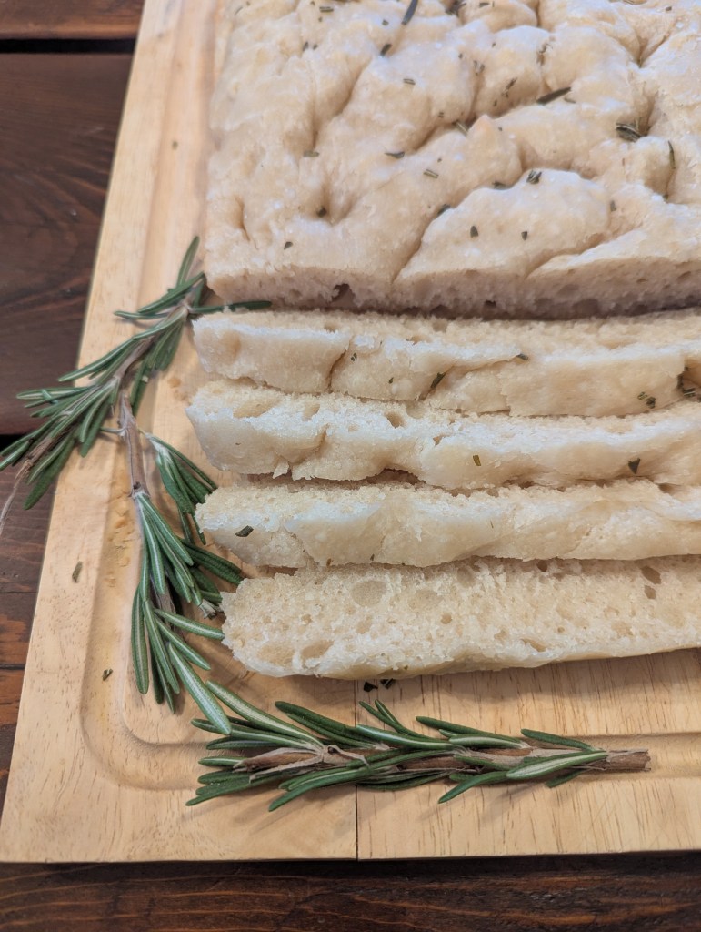 Sourdough focaccia recipe on a wooden table