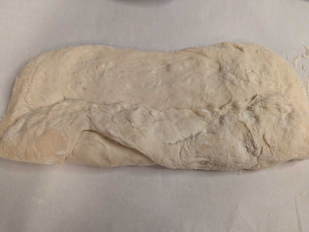 Shaping sourdough baguette dough