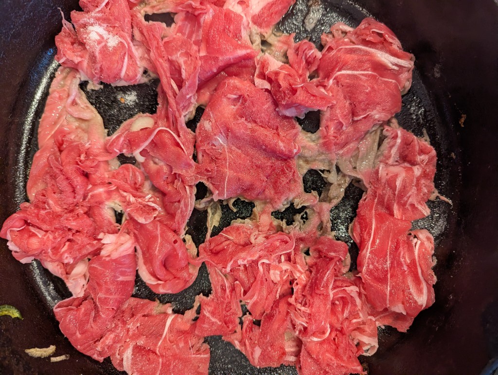 Sauteing beef for Philly cheesesteaks