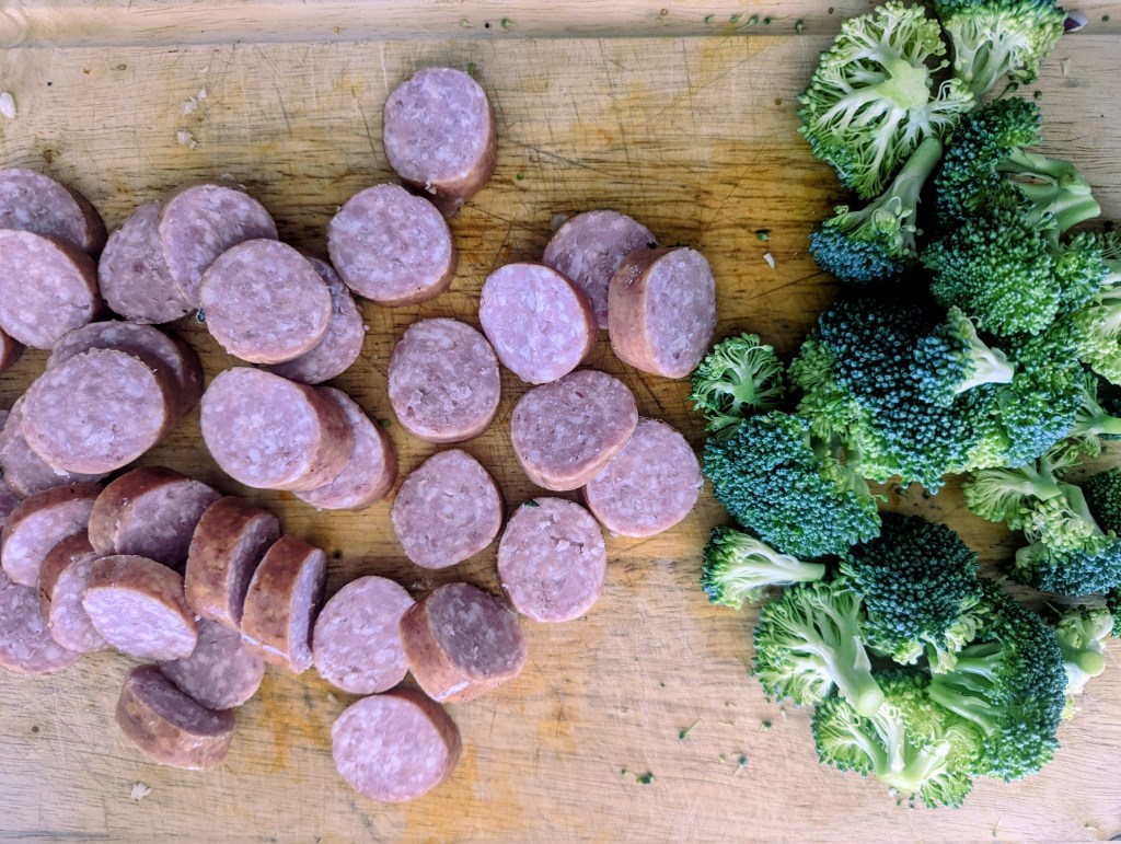 Broccoli florrets and kielbasa for a kielbasa sheet pan