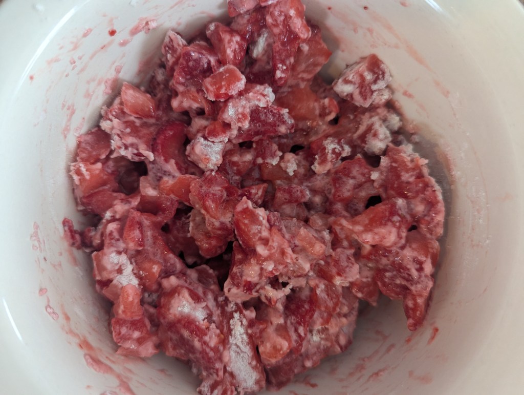 Preparing diced strawberries for strawberry sourdough bread