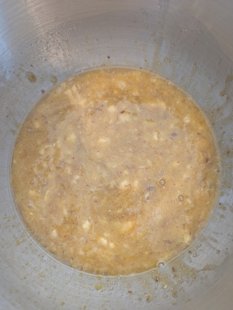 Mixing wet ingredients for gluten-free chocolate chip banana bread