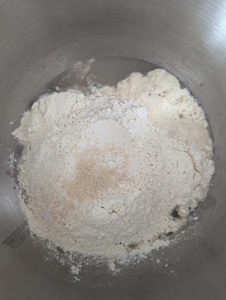 Mixing ingredients for sourdough discard English muffins