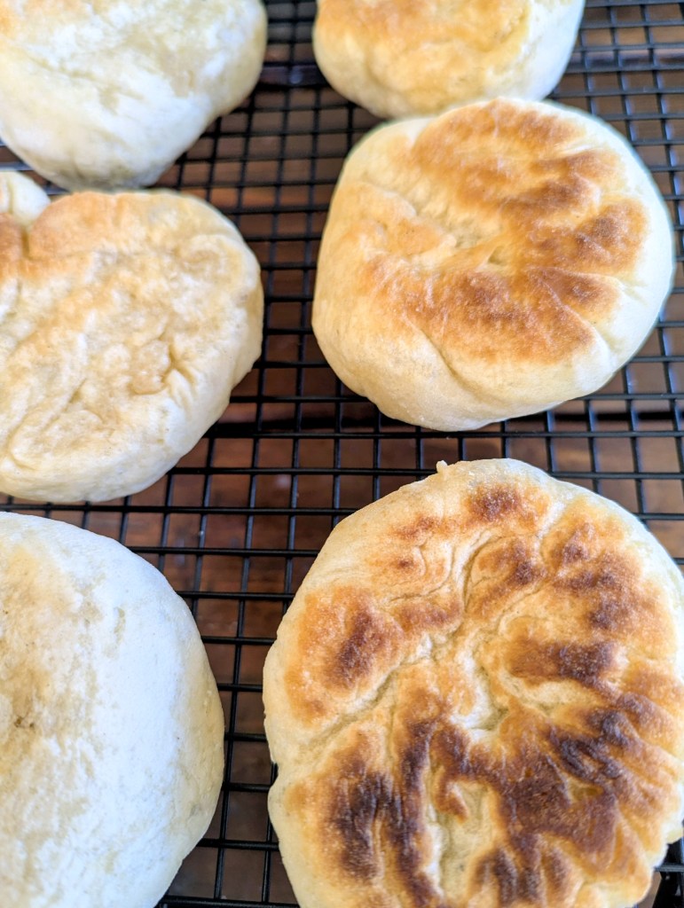 Sourdough discard English muffins recipe on a wire rack