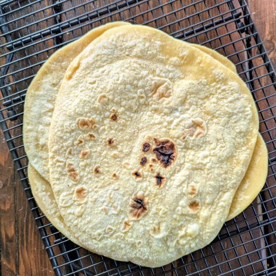 Einkorn tortilla recipe on a wire rack