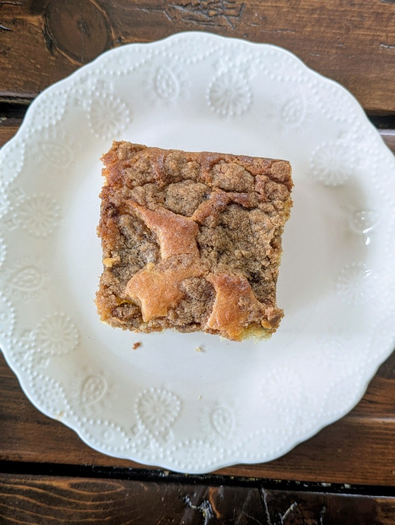 Slice of sourdough discard coffee cake